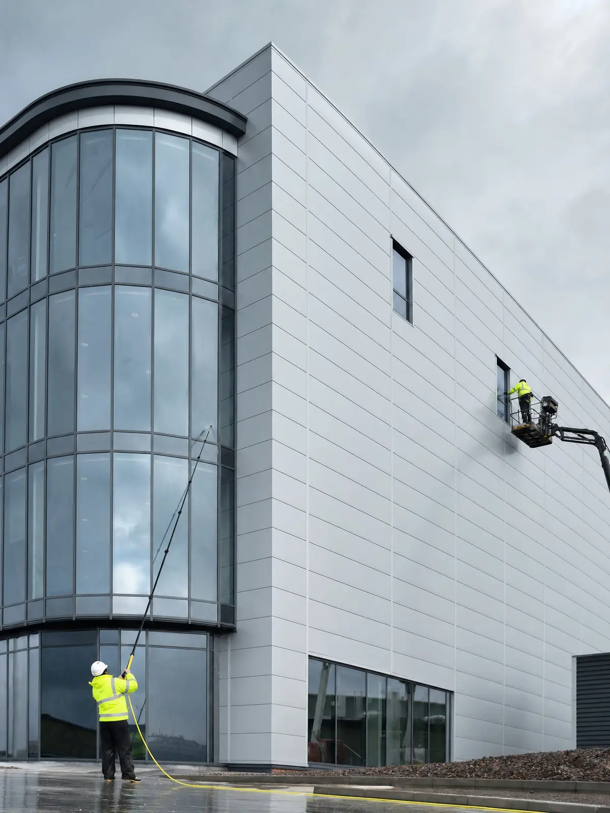 A tall modern cladding elevation looking bright and clean after washing