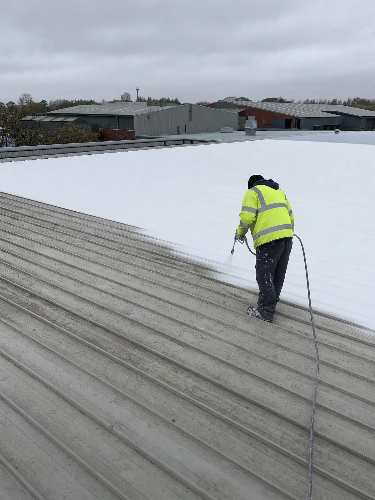 A freshly spray-coated commercial roof